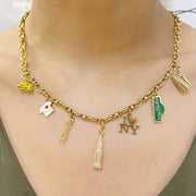 KIKICHIC NYC Charm Necklace. Gold Charm Necklace. Metro Card Charm Necklace. Yellow Taxi Charm Necklace, Empire State Building Charm Necklace, New York Word Charm Necklace, Fifth Avenue Street Sign Necklace, Metro Card Gold Charm Necklace.