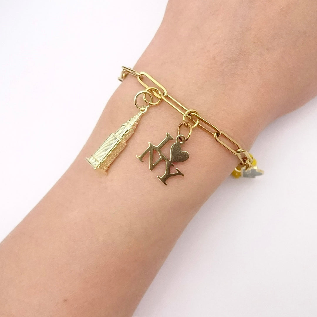 KIKICHIC | Gold New York City Charm Bracelet | Taxi Charm