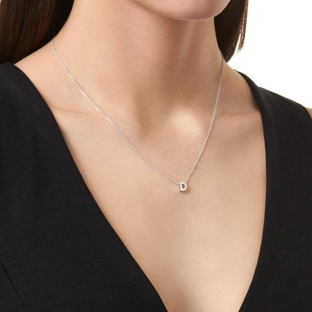 KIKICHIC This delicate CZ pavé letter D initial necklace is perfect for every day. Adorable initial necklace featuring in silver and 18k gold finish with CZ stone. Simple, delicate and elegance, perfect to match your outfit for everyday wear or for a special event. Dainty, simple, elegant and sweet design made to keep your loved one near your heart. The perfect gift to celebrate birthday, anniversary, valentine's, Christmas or more.