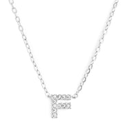 KIKICHIC This delicate CZ pavé letter F initial necklace is perfect for every day. Adorable initial necklace featuring in silver and 18k gold finish with CZ stone. Simple, delicate and elegance, perfect to match your outfit for everyday wear or for a special event. Dainty, simple, elegant and sweet design made to keep your loved one near your heart. The perfect gift to celebrate birthday, anniversary, valentine's, Christmas or more.