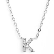 KIKICHIC This delicate CZ pavé letter K initial necklace is perfect for every day. Adorable initial necklace featuring in silver and 18k gold finish with CZ stone. Simple, delicate and elegance, perfect to match your outfit for everyday wear or for a special event. Dainty, simple, elegant and sweet design made to keep your loved one near your heart. The perfect gift to celebrate birthday, anniversary, valentine's, Christmas or more. More Details: - Carefully Handmade - Sterling Silver (925) - Cubic Zirconia