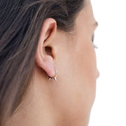 KIKICHIC 18k Gold Tiny Spike Hoop Earring, Sterling Silver Spike Huggie Earring, Small Hoop Earring, Tiny Hoop Earring, Mini Huggie Hoop Earring. Get ready to shine with these stunning endless CZ tiny spike huggie hoop earrings! They feature impressive and eye-catching pave crystals that really elevate this style. You'll love the sophisticated and polished look of these tiny hoops for your everyday lifestyle. These beautiful earrings feature a secure hinged closure for the ease of taking them on and off.
