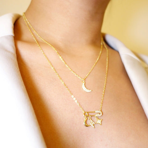 KIKICHIC 14k Gold Safety Pin Charms necklace, yellow gold cz safety pin necklace, dangling charms safety pin necklace, safety pin charm moon chain, starburst paper clip necklace, moon, star, lightning bolt chain necklace.
